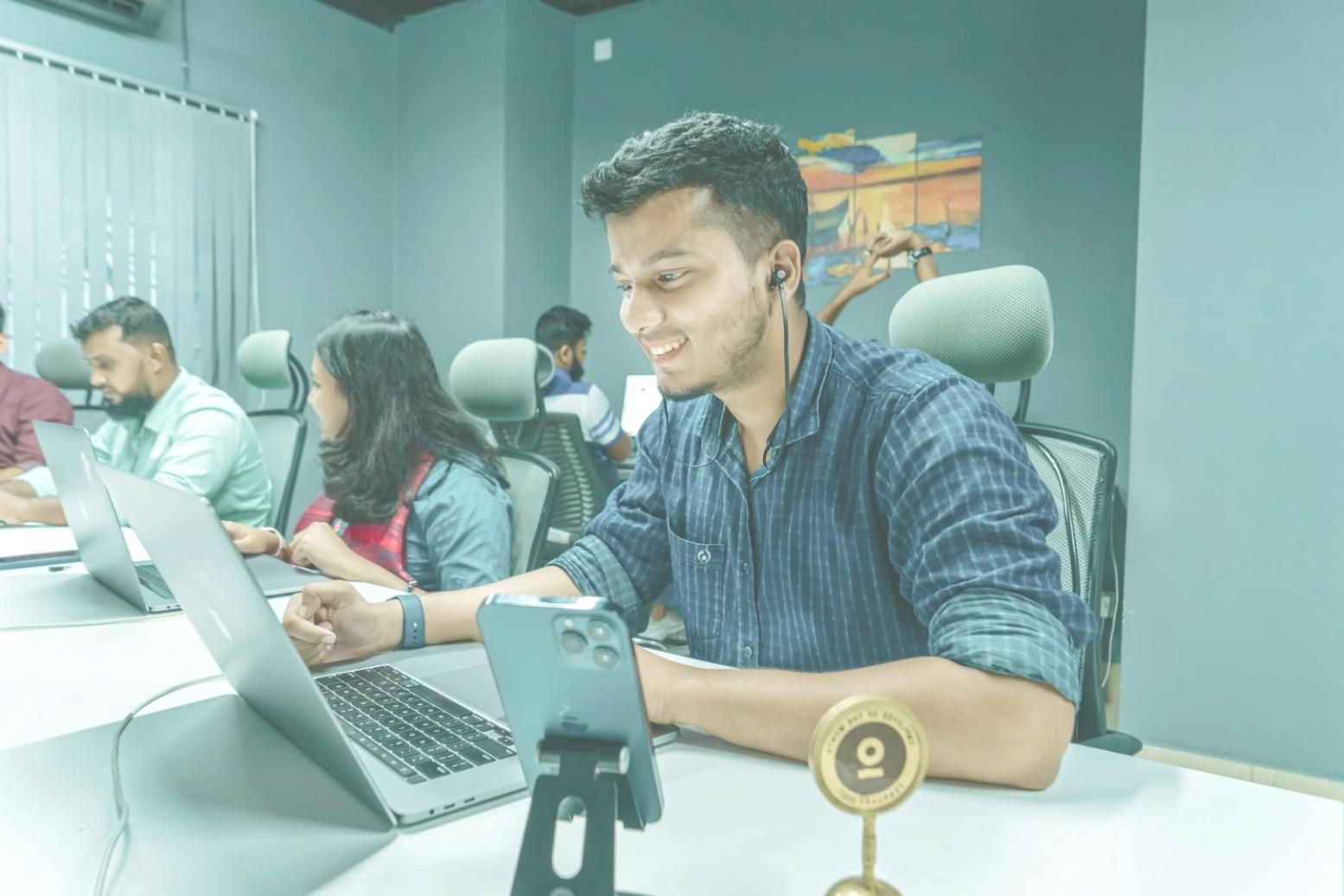 Professional training environment showing collaborative learning setup
